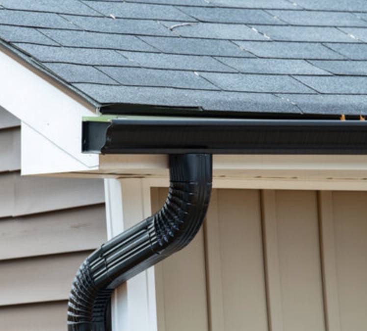 New black guttering and downpipe